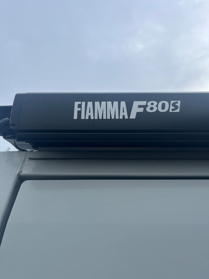 Living the Dream…… and This Eye Catching Campervan for Sale a Nissan NV 400 SE D side photo 3